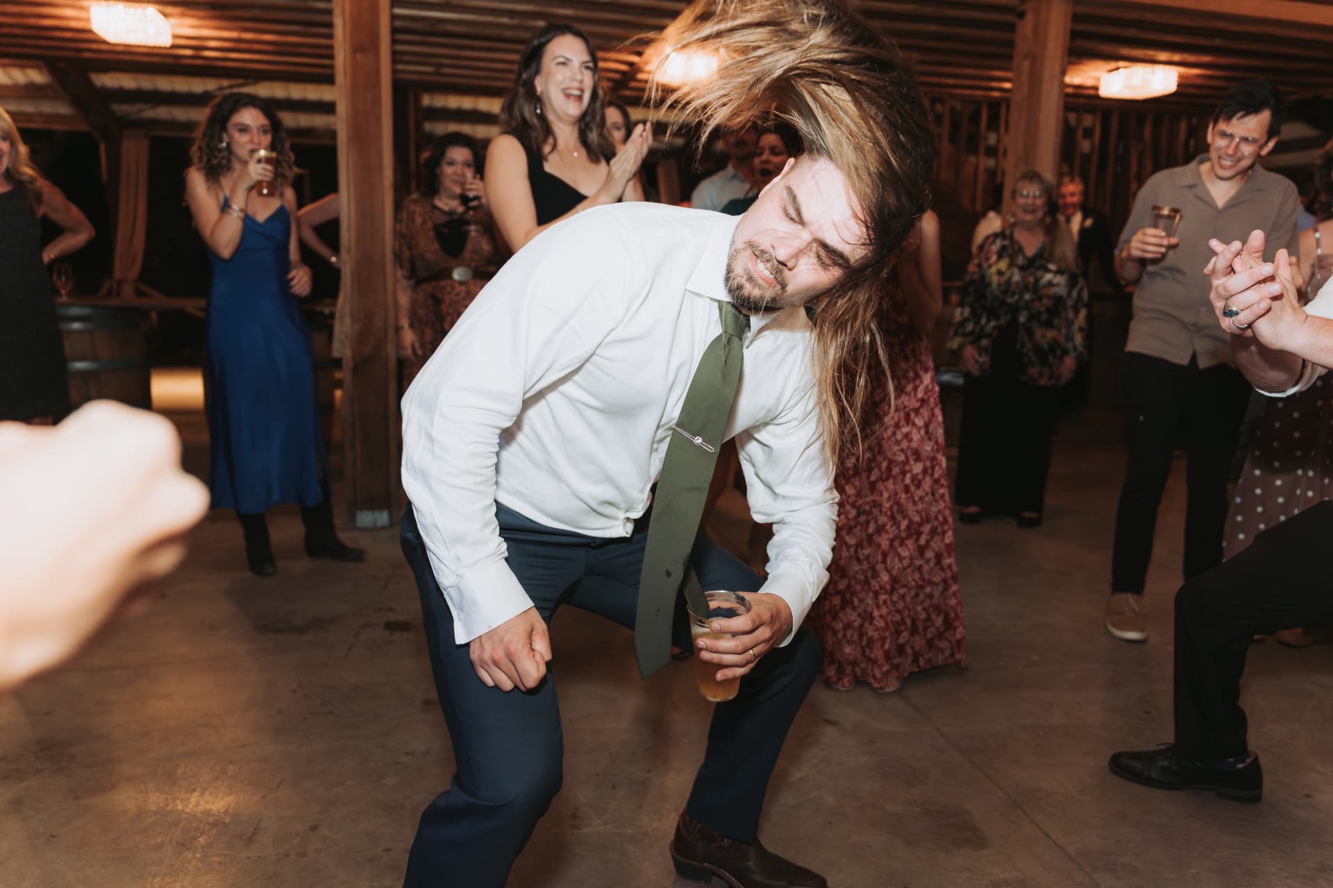 Guest mid-hair-flip on the dance floor